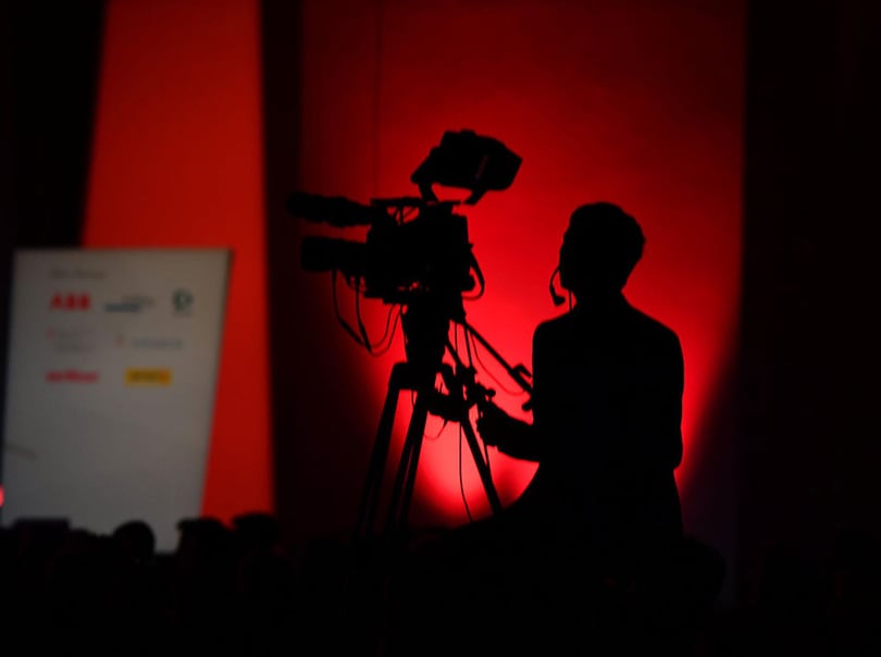 A cameraman during the recordings for a livestream